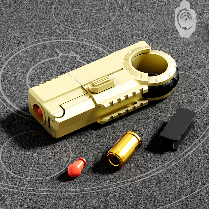 Compact Golden Agent Finger Gun for Stealthy Carry