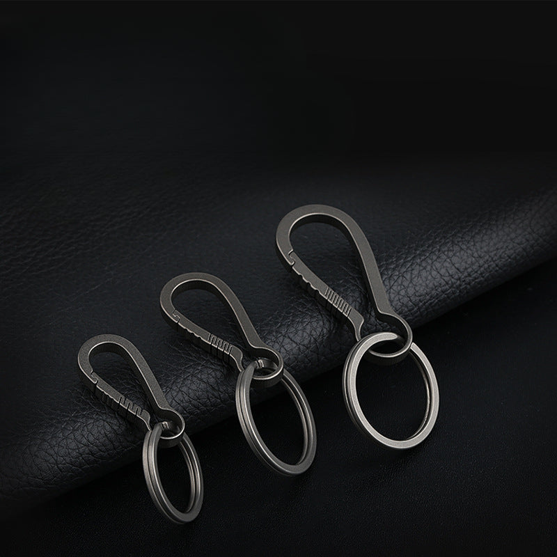 Sleek Titanium Keychain Clip with Innovative Car Accessory Design