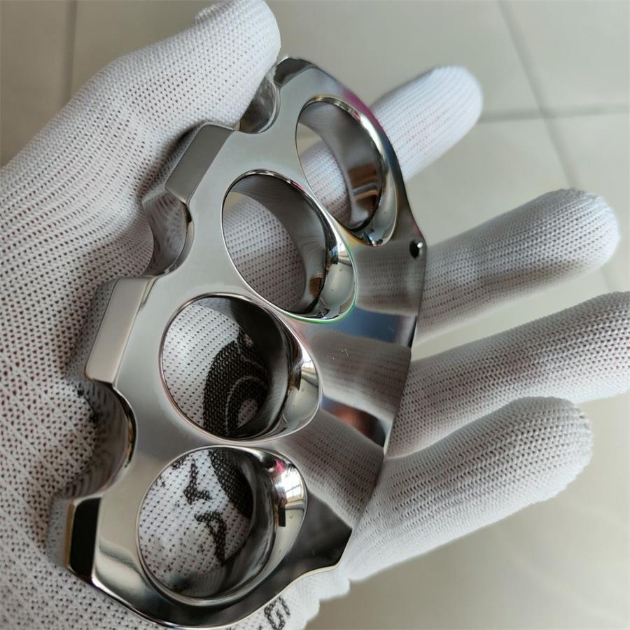 Polished Titanium Knuckle Duster with Sleek Reflective Surface