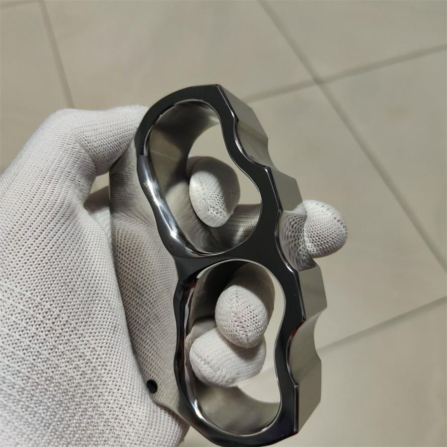 Sleek Polished Titanium Knuckle Duster for Superior Defense