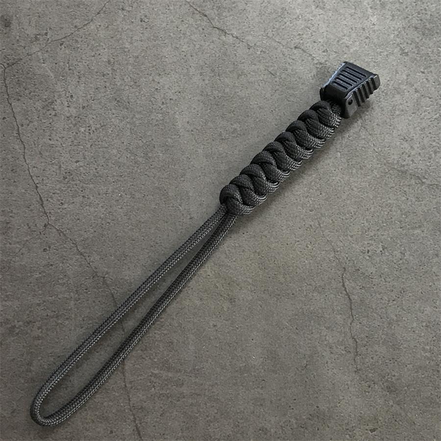 Braided paracord with knuckle support lanyard