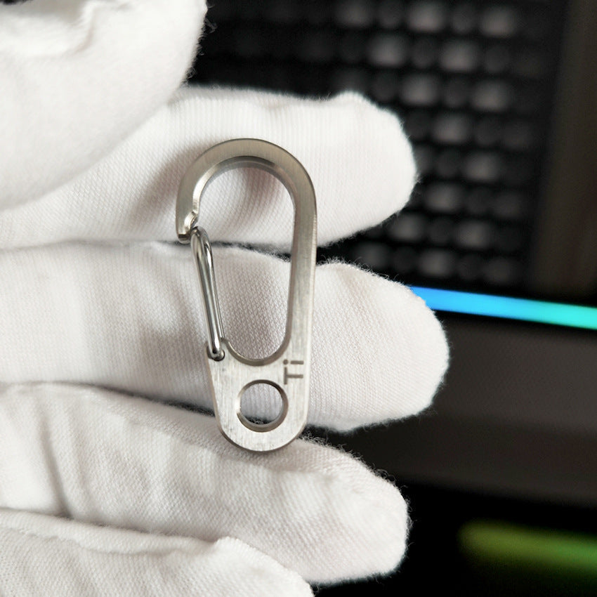 Titanium Spring-Loaded Keychain Carabiner Multi-Tool with EDC Flashlight