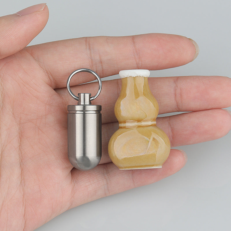Portable Titanium Pill Box with Waterproof Keychain Design