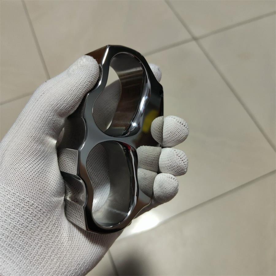 Sleek Polished Titanium Knuckle Duster for Superior Defense