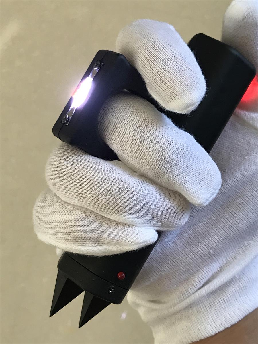 Self-Defense Stun Gun with Multi-Function Knuckle Duster Tool